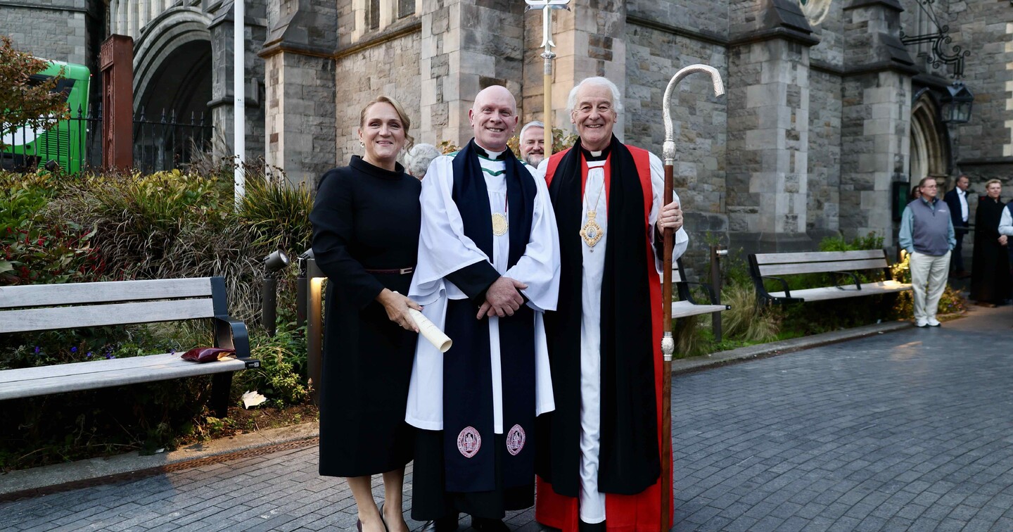 Dean Tom O&rsquo;Brien (centre) with his wife Daniela and Archbishop Michael Jackson. 