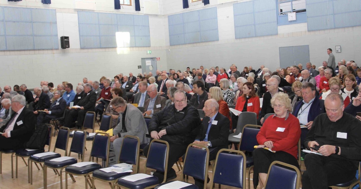 Members of Diocesan Synod take their seats for the start of business.
