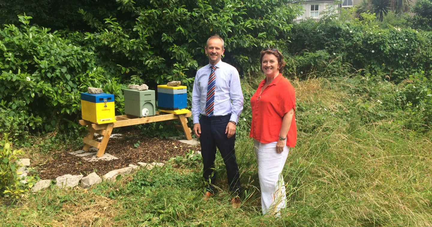 Mr David Ritchie, Chief Officer and Secretary General, and Ms Fern Jolley, Property Officer, with the Representative Church Body&rsquo;s new bee hives.
