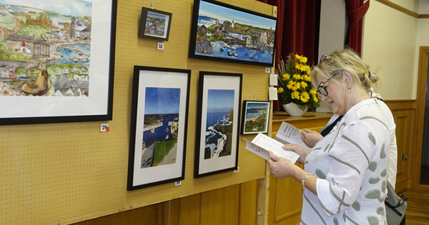 Enjoying the work on display in Dunluce. Photo: David Johnston.