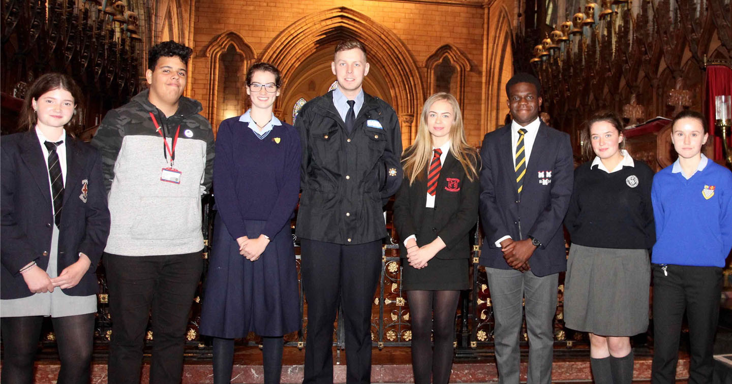 Participants in the Second Level Schools&rsquo; Service with Garda Marc Kelly.