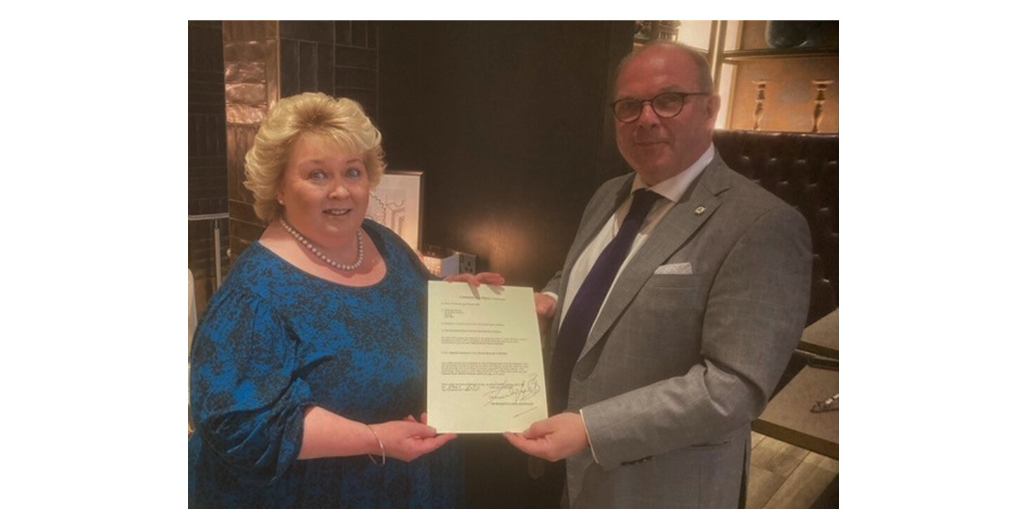 The Lord Lieutenant, Dame Fionnuala Jay&ndash;O&rsquo;Boyle DBE DStJ DDL (Hon QUB), presenting Canon Graham with his Commission as a Deputy Lieutenant. Photo credit: Dr Alan Boyd DL, Vice Lord Lieutenant of the County Borough of Belfast.