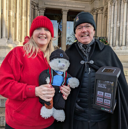 Black Santa is back on the Cathedral steps!