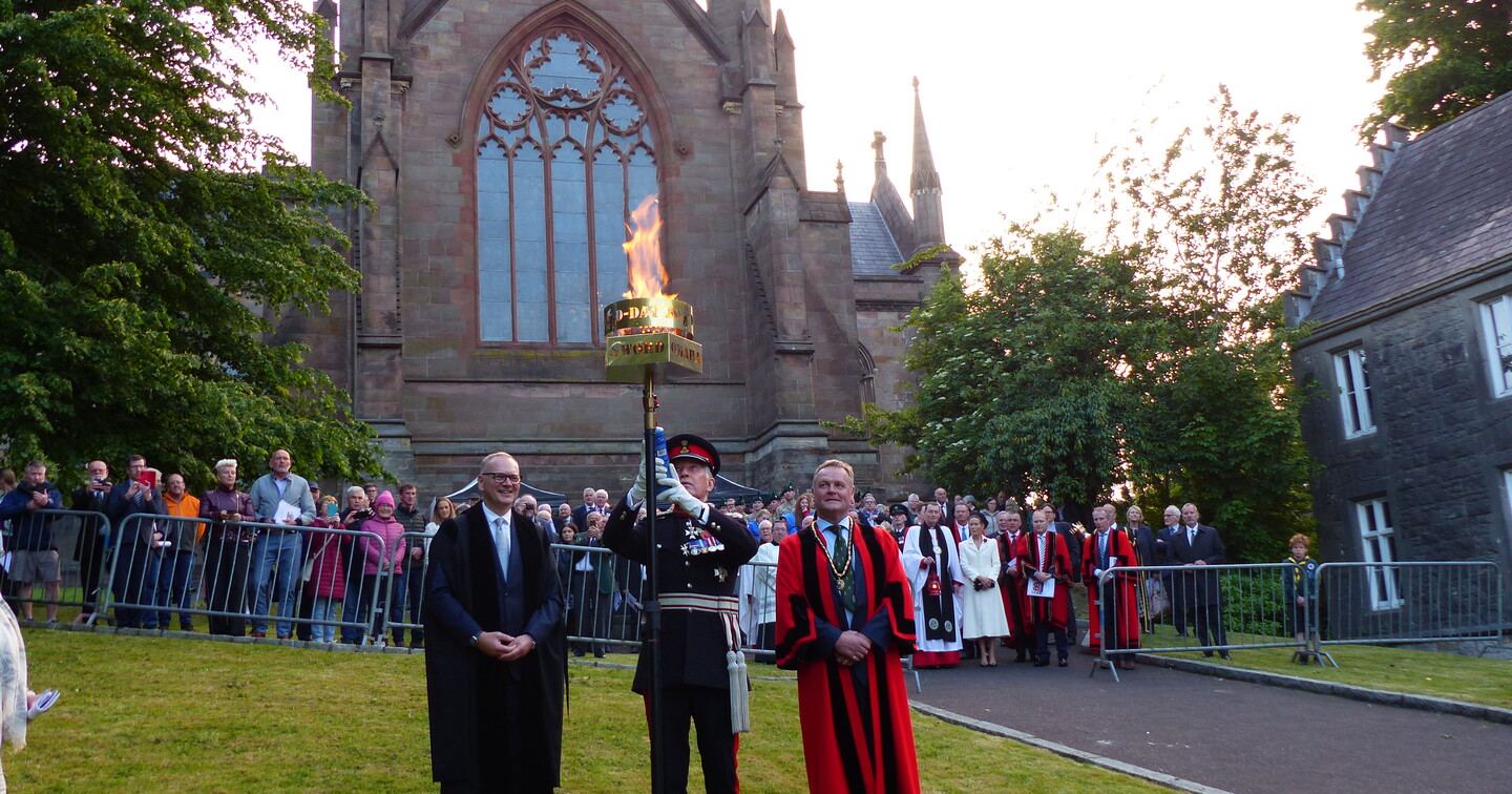 The Lord Lieutenant lights the beacon.