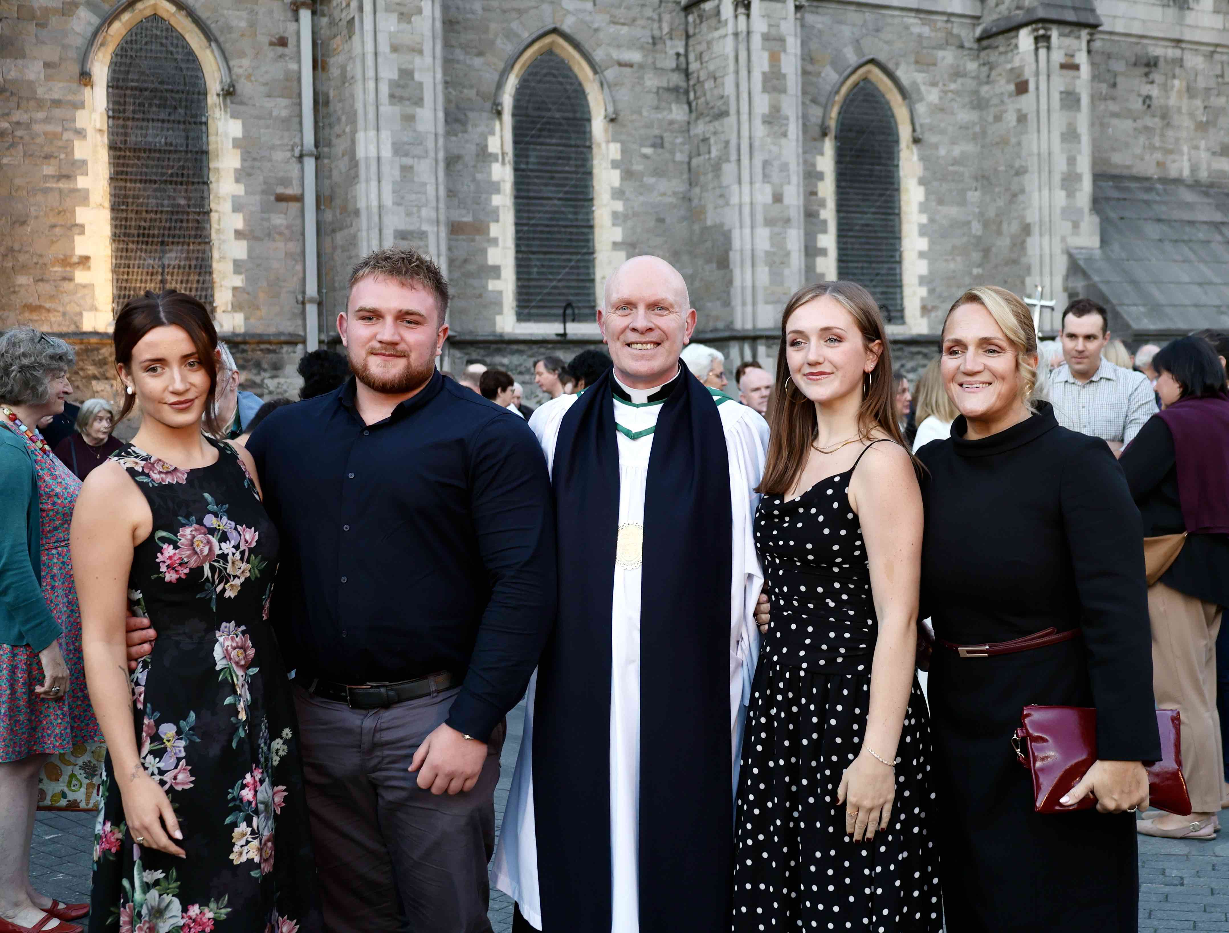 Dean Tom O'Brien with his family following his installation.