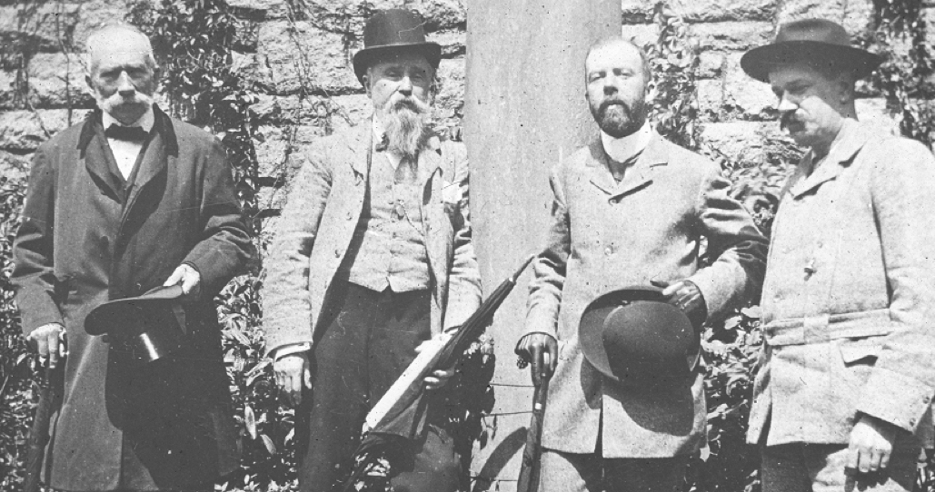An image from the collection showing four men who oversaw the excavation in the graveyard. We have identified the two on the left as Dr Emmet and Mr Fuller, however the two other men remain a mystery.