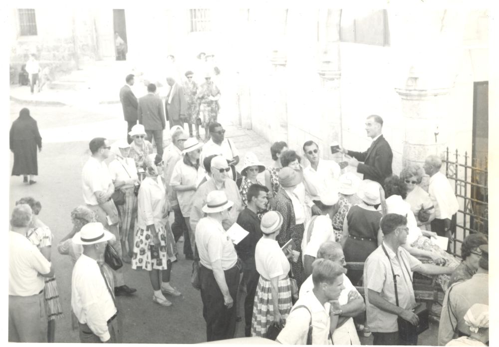 The Rt Revd Roderic Coote (1915-2000) suffragan bishop of Fulham 1956-65 (and formerly curate of St Bartholomew's, Dublin 1938-41) leading pilgrims in Jerusalem, RCB Library Ms 605
