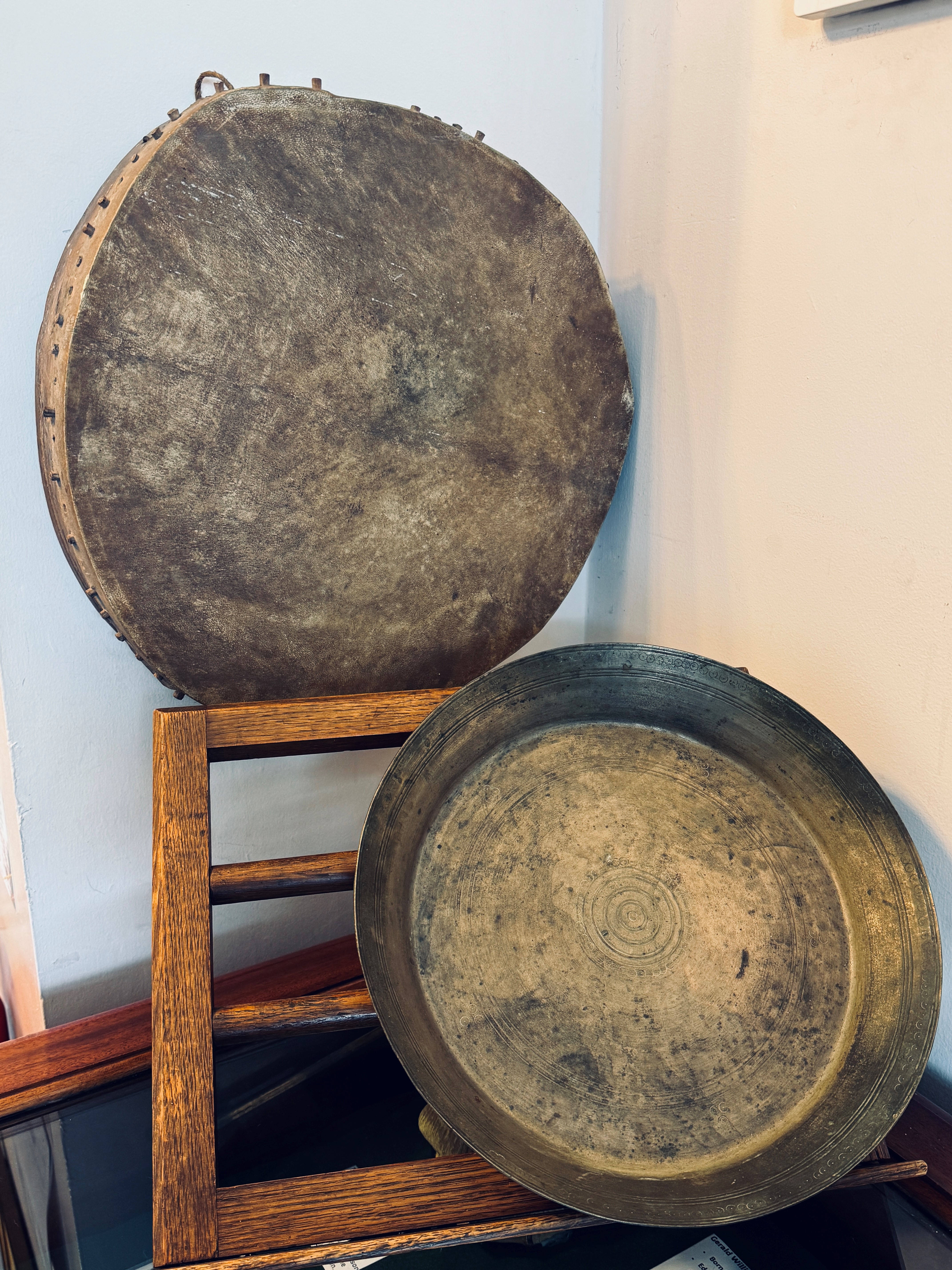 Figure 6. Ceremonial Drum and Brass Pan on display at RCB Library.