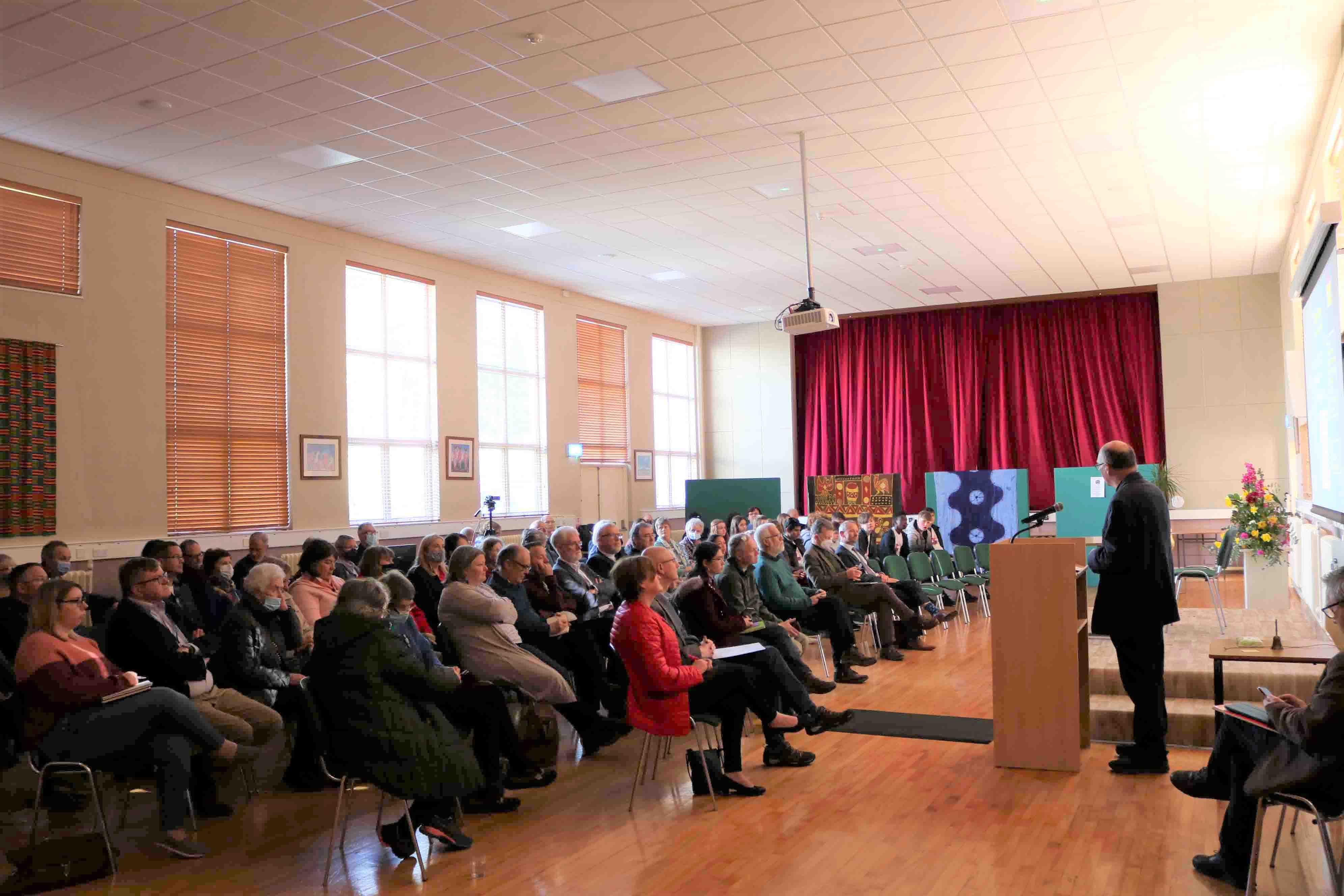 Canon Andrew Orr opens the conference.