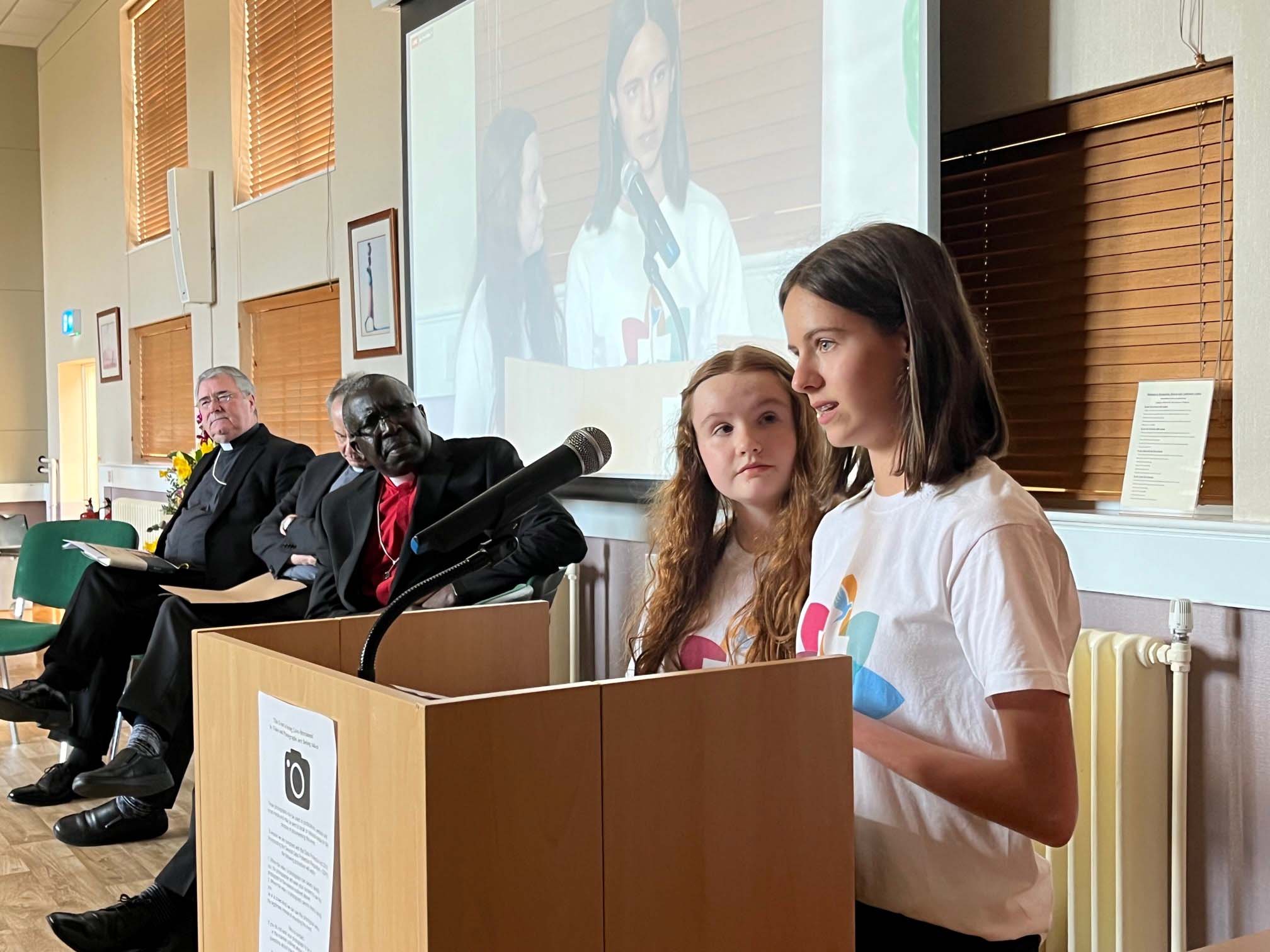 Tori and Isabella address (and impress) the delegates.