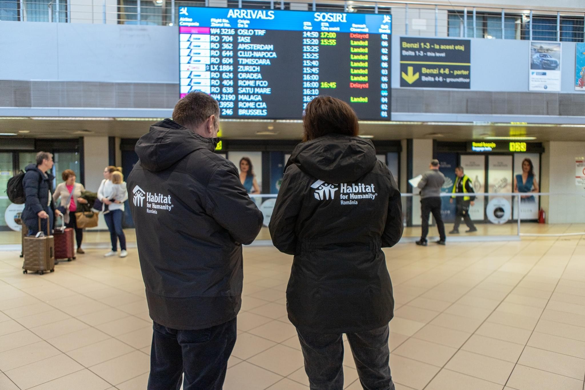 Habitat for Humanity volunteers welcoming arrivals from Gaza in Bucharest, Romania.