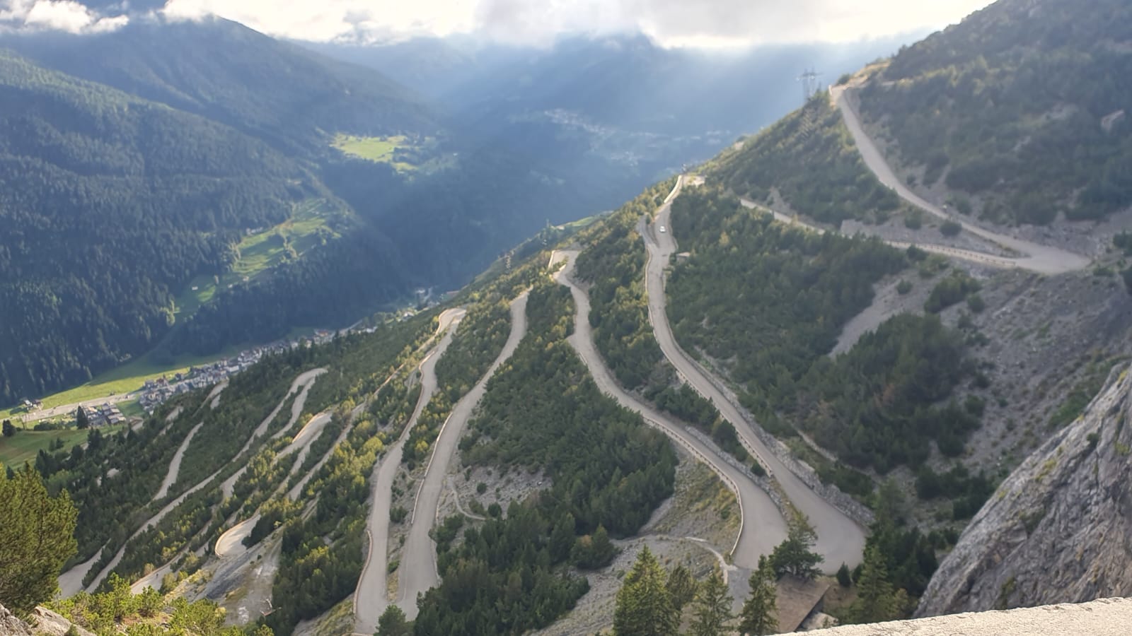 Sun breaks through clouds among the Italian Alps.&nbsp; Photo credit: Jonathan Hull.