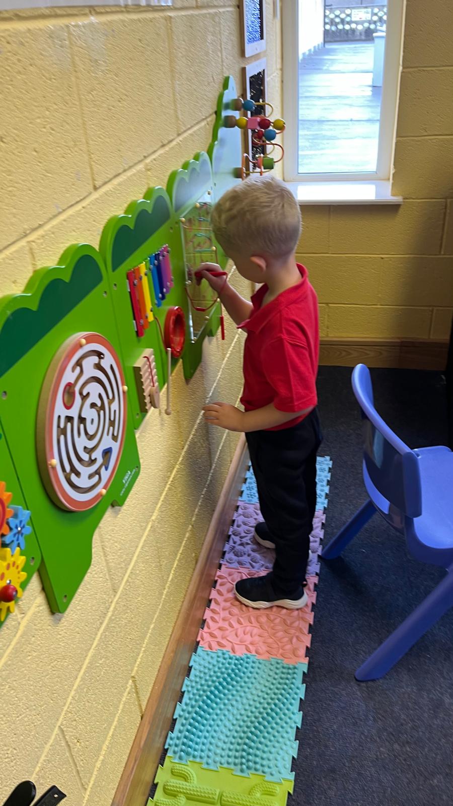 Children in Killeshandra National School enjoying their new sensory equipment, funded with the support of the Church Education Society.