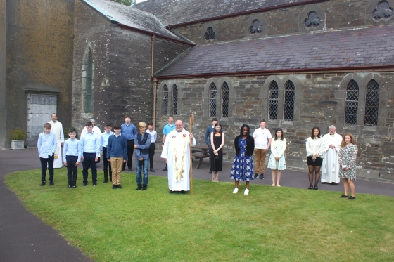 The confirmands with their Bishop, the Right Rev. Dr Paul Colton (middle), and their Rectors, the Rev. Steve McCann (left) and the Rev. John Ardis (right).