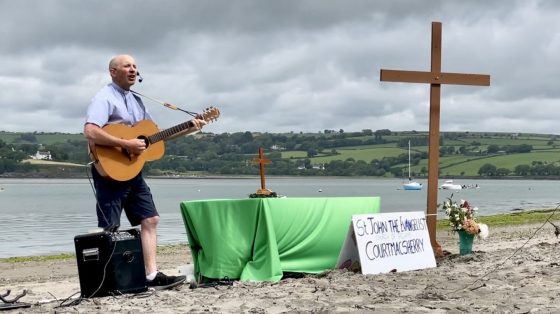 The Rev Kingsley Sutton leading worship.