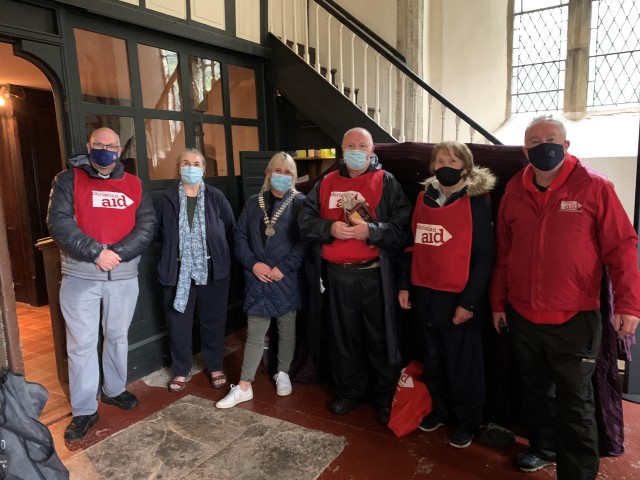 Cllr Mary Linehan Foley, Mayor of County Cork, and parishioners of Youghal greet the Reverend Tony Murphy on the final day of his 100km walk.