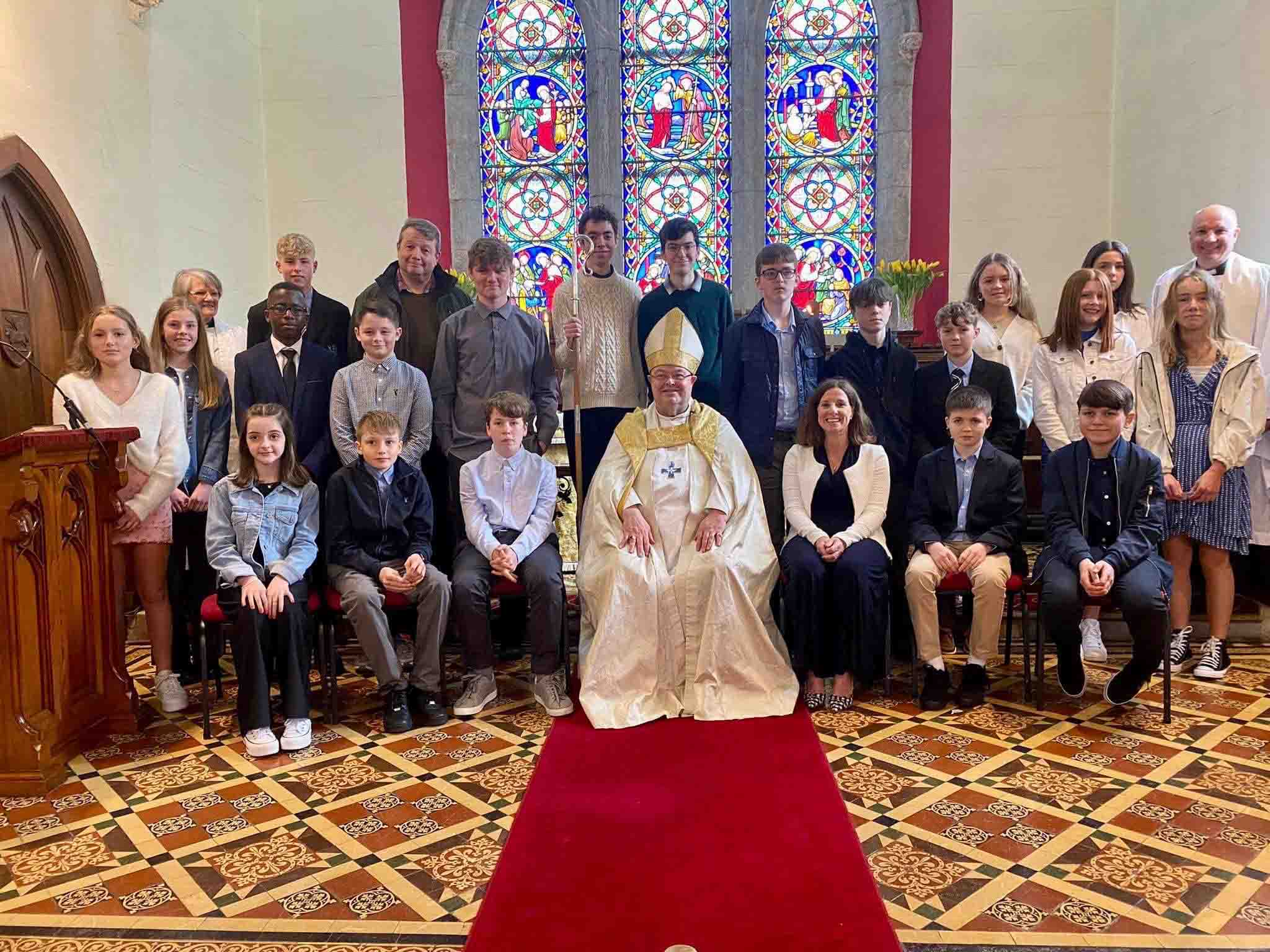 The confirmands of Douglas Union with Frankfield together with their Bishop, Paul Colton, and their Rector, Adrian Wilkinson.