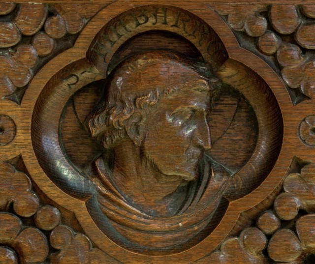 Wood carving of St Fin Barre on the Bishop's Throne in St Fin Barre's Cathedral.