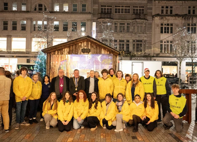 The Bishop of Cork, Cloyne and Ross, the Right Reverend Dr Paul Colton, the Lord Mayor of Cork, Cllr Dan Boyle, and the Bishop of Cork and Ross, the Most Reverend Dr Fintan Gavin, with students at the launch of Cork's Iconic S.H.A.R.E. Crib on St. Patrick Street. Photo: Gerard McCarthy.