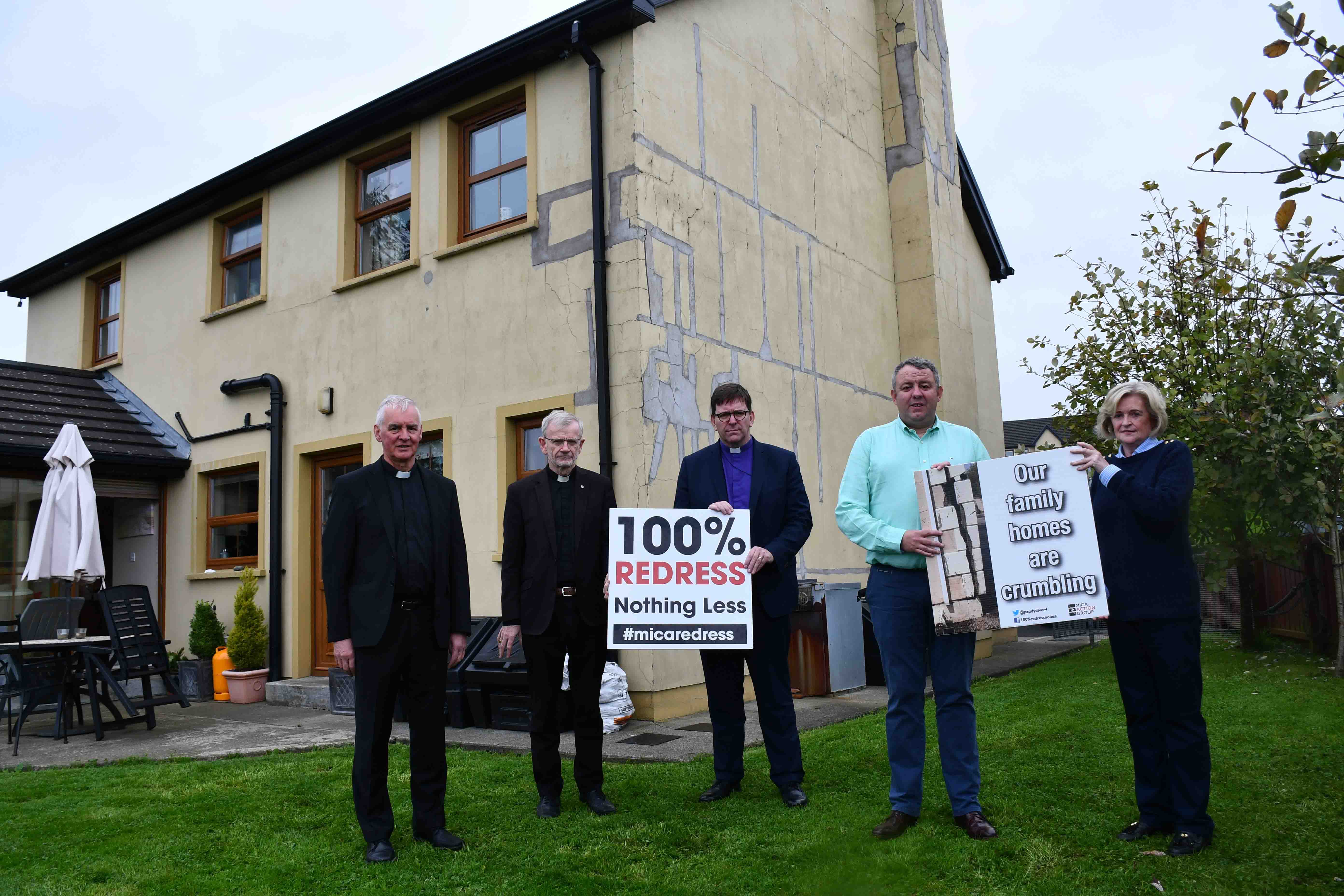 Mary O'Regan, and her neighbour, Declan Glackin, share their plight with the church leaders at Mary's home in Manorcunningham.