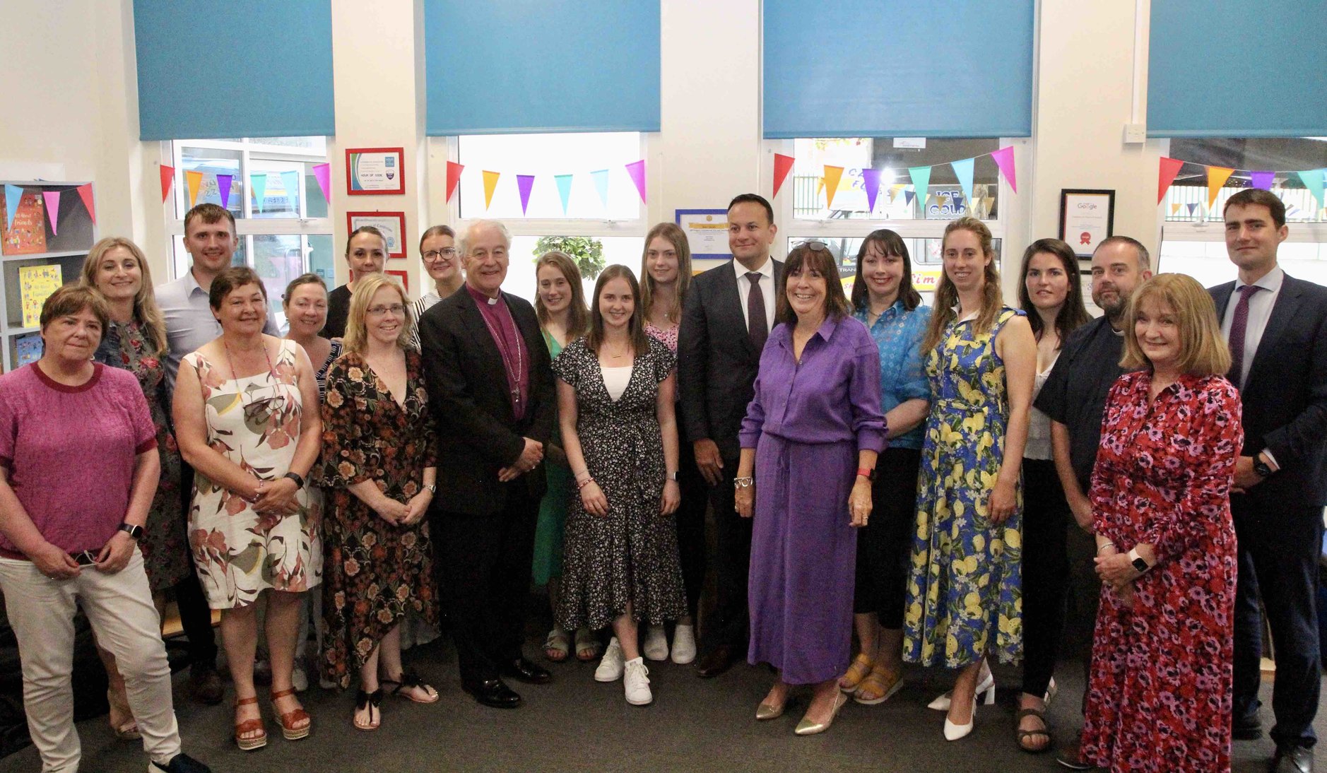 Taoiseach Leo Varadkar, Minister Jack Chambers, Archbishop Michael Jackson and the Revd Colin McConaghie with the staff of Castleknock National School.