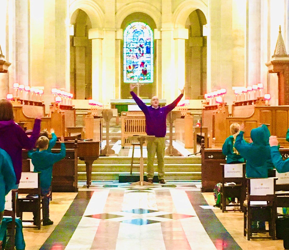 Belfast Cathedral's Director of Music, Matthew Owens, leading vocal warm-ups during the Belfast Cathedral Music Summer School.