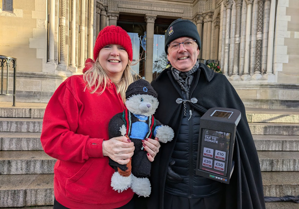 Christian Aid CEO Rosamond Bennett with Dean Forde and his new mascot.