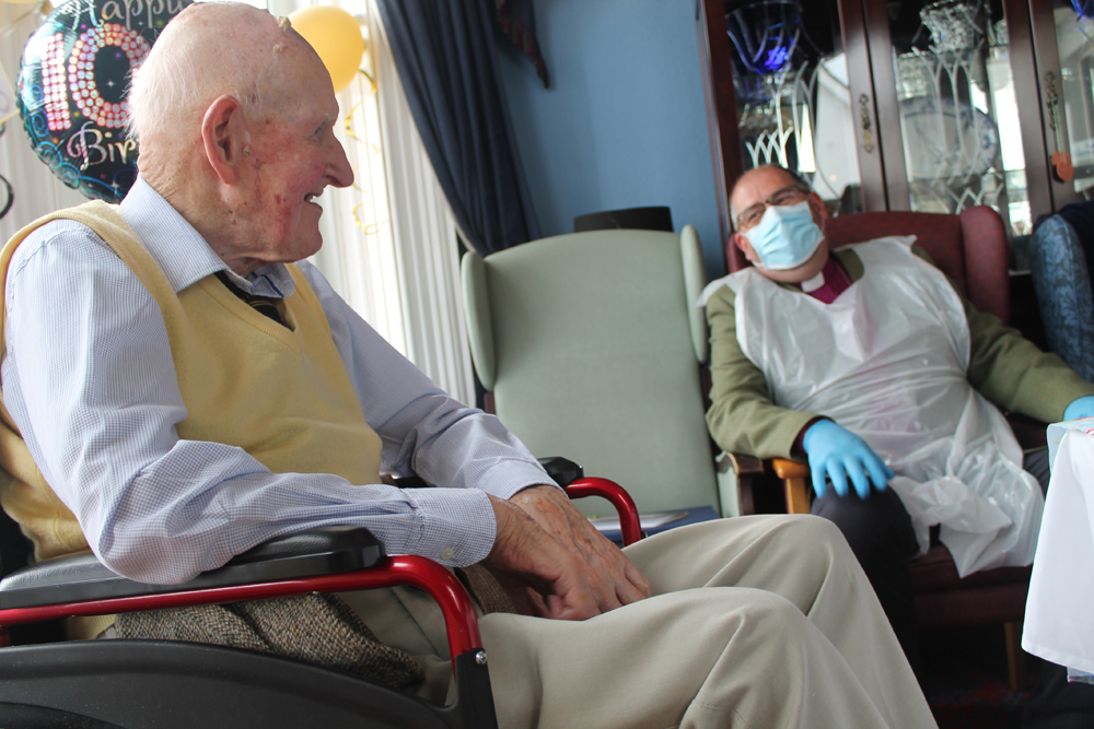 Centenarian Clem Shaw shares a joke with the Bishop of Connor, the Rt Rev George Davison at his special party.
