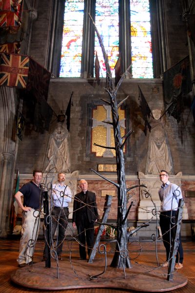 Edward Bisgood of Bushy Park Ironworks, cathedral administrator Gavan Woods, Dean Victor Stacey and education officer Andrew Smith at the new &lsquo;Tree of Remembrance' in St Patrick's Cathedral.