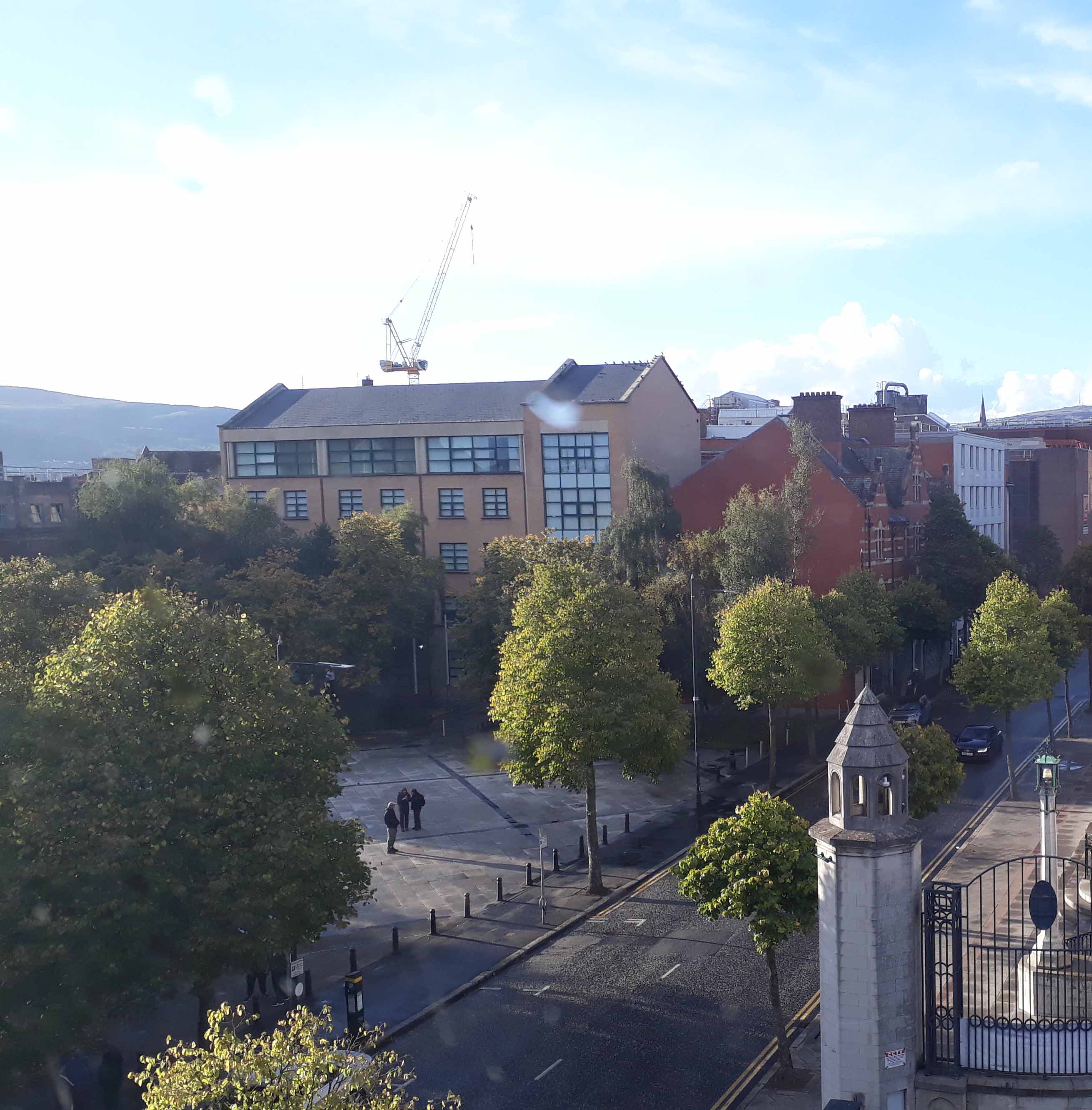 An autumnal evening view of Writers' Square, Belfast.