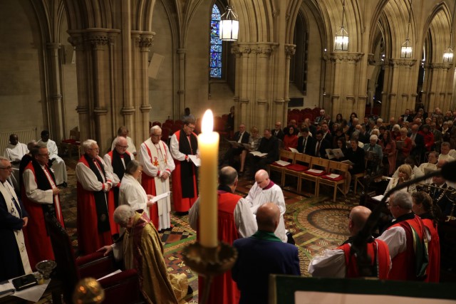A view from the candle-lit pulpit.
