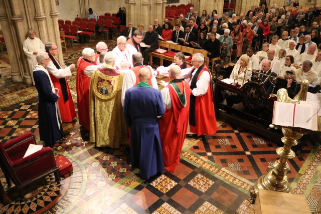 The laying on of hands.