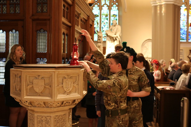 Lamps of peace presented by young people.