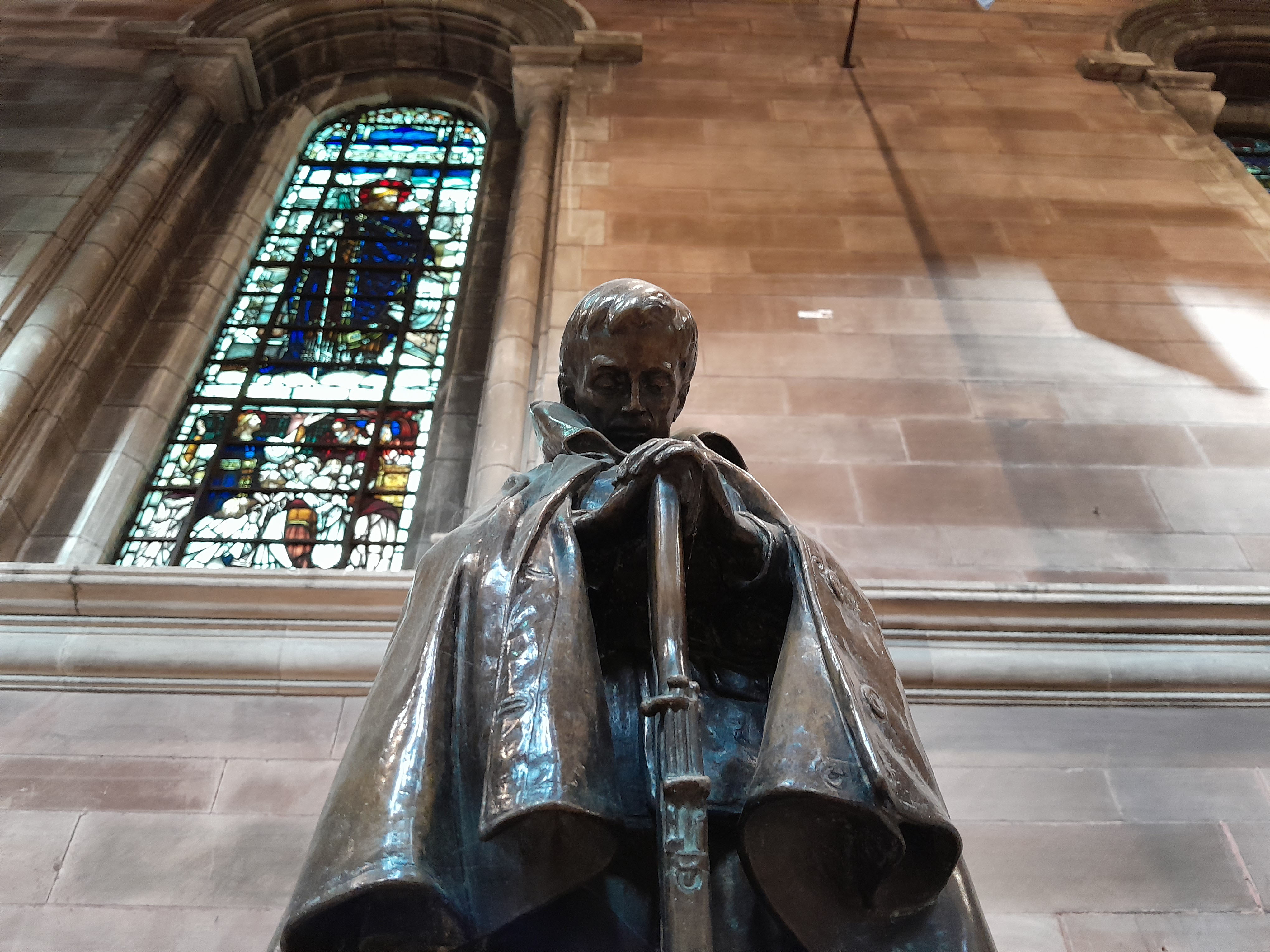 A soldier's statue in bronze at Belfast Cathedral as part of the memorial containing the books of the names of people from Ireland who died in military service in the First World War.