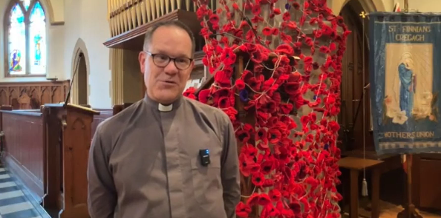 Canon Jono Pierce, Rector of St Finnian's, with the display in the church building.