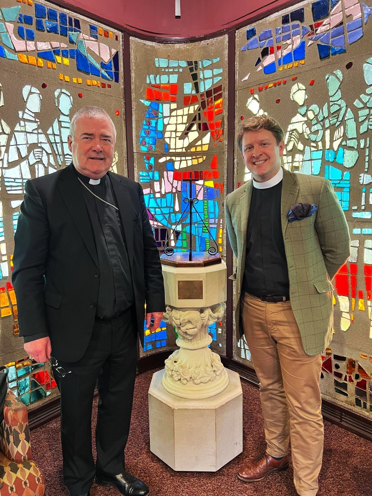 The Revd Andrew Ogletree, Rector of St Patrick's, welcomes Archbishop McDowell.