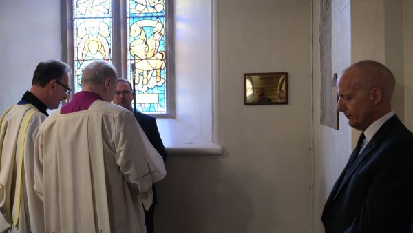 A plaque in memory of the Revd Kerry Waterstone and Mrs Edie Waterstone is dedicated.