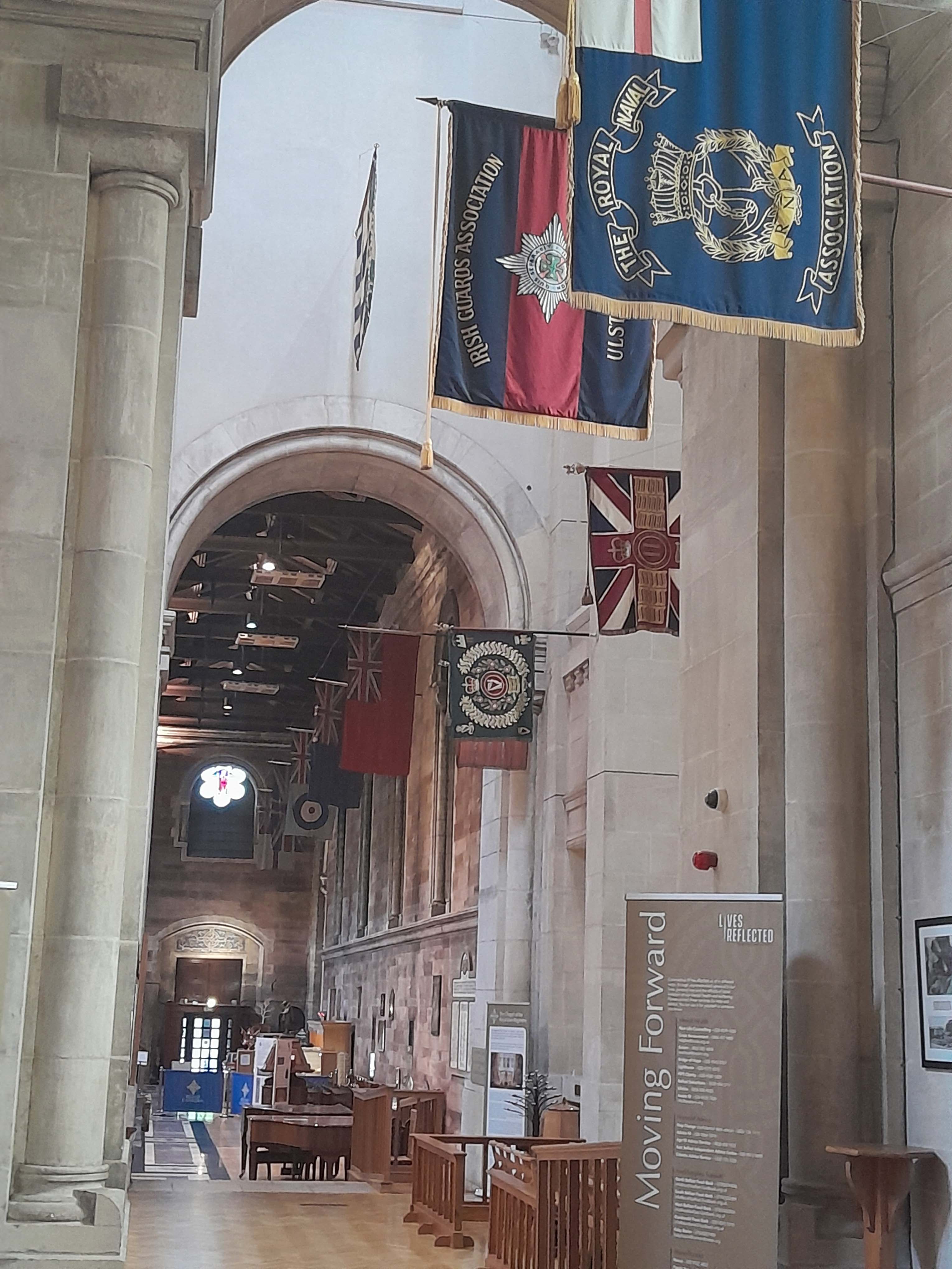 Military standards laid up within Belfast Cathedral.